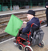 Bernard Holden flags the recreation of the inaugural train into Horsted Keynes from Ardingly - Richard Clark - 17 May 2010