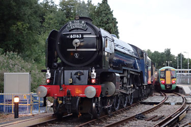 Tornado trails the departing train at East Grinstead - Brian Lacey - 10 Sept 2013