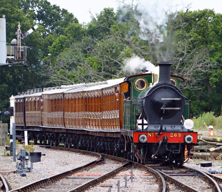 H-class approaching Horsted Keynes with Met coaches - John Sandys - 18 August 2015