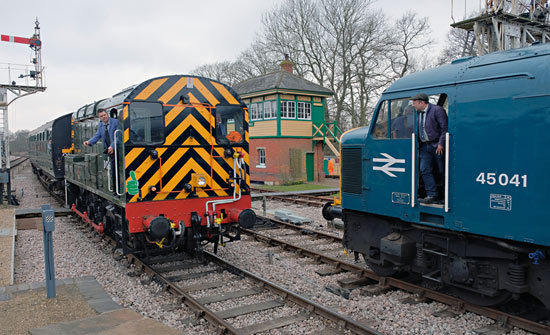 Thunderbird arrives at Horsted Keynes as Peak 45041 waits - Brian Lacey - 24 March 2018